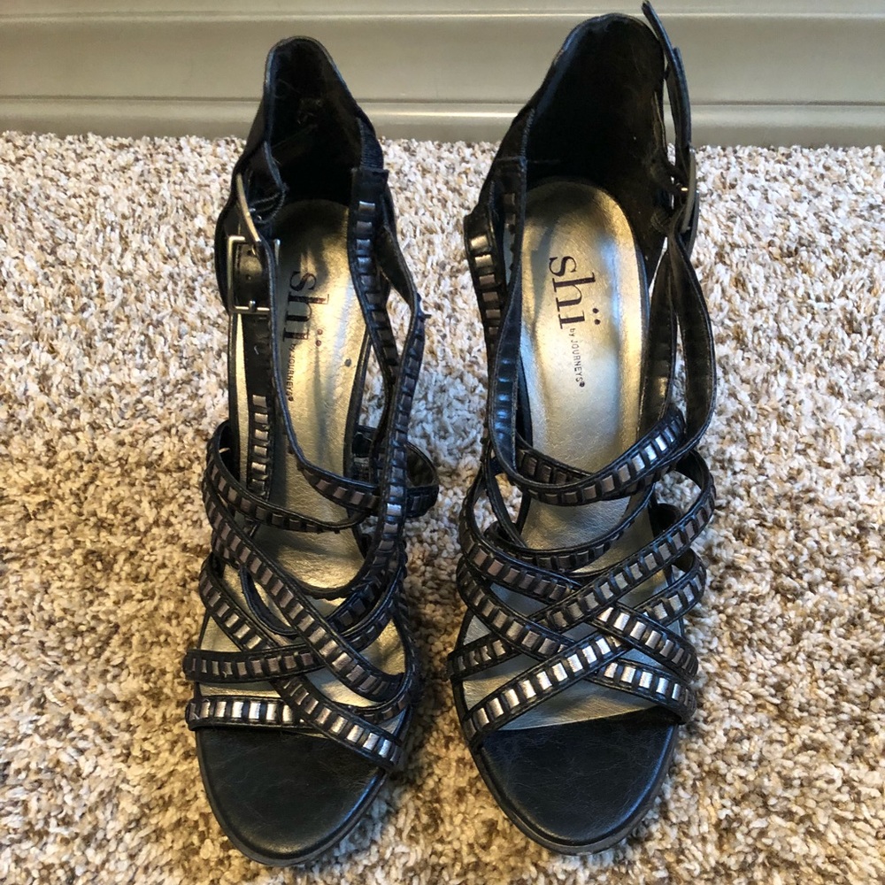 Black strappy heels with silver details